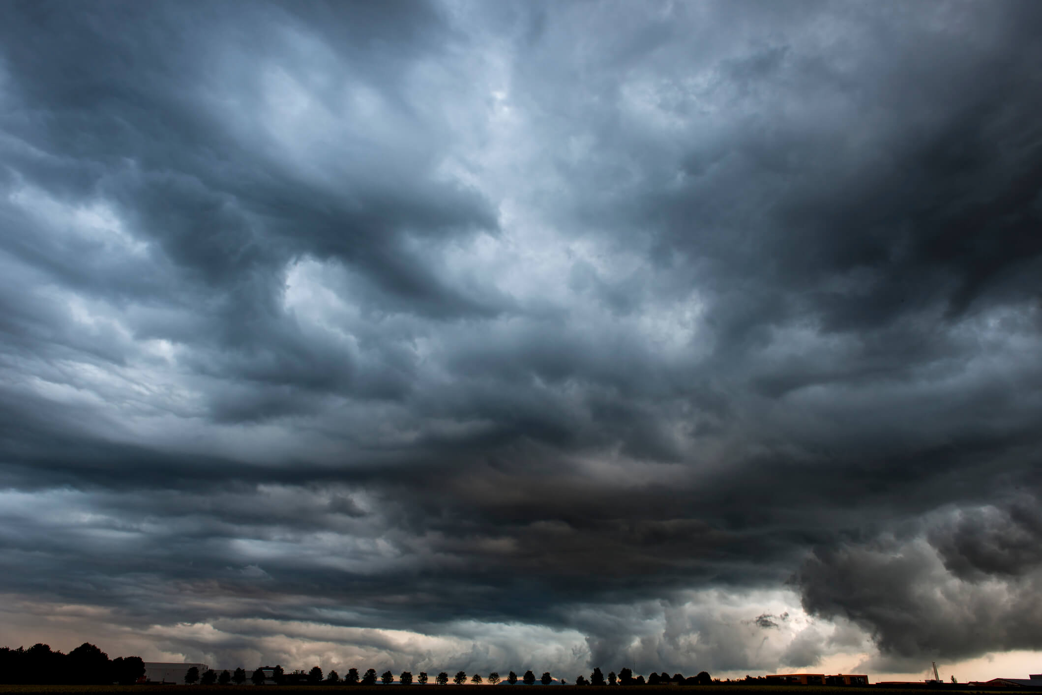 Stormy cloudy sky dramatic dangerous dark gray cloudscape
